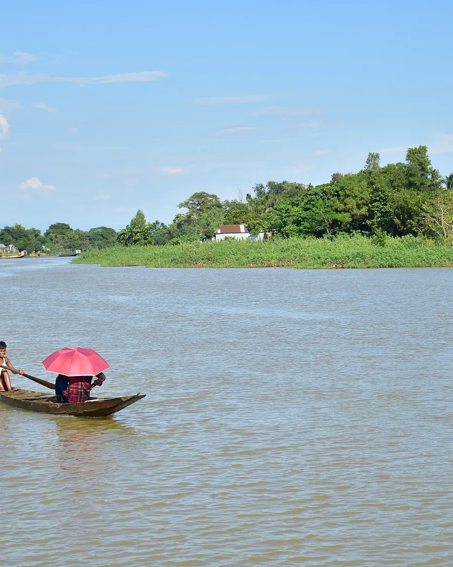 Boat on the still water of Tanguar Haor