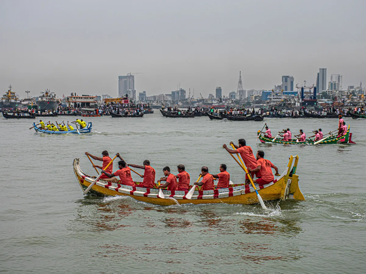 Traditional boat race with rowers in yellow