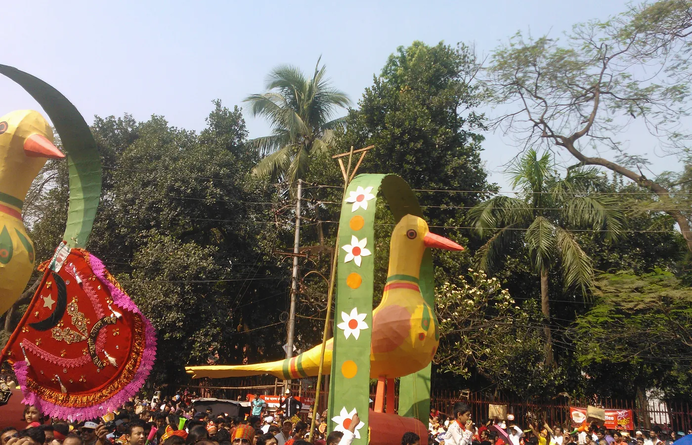 Giant folk effigies carried through the streets at Bengali new year
